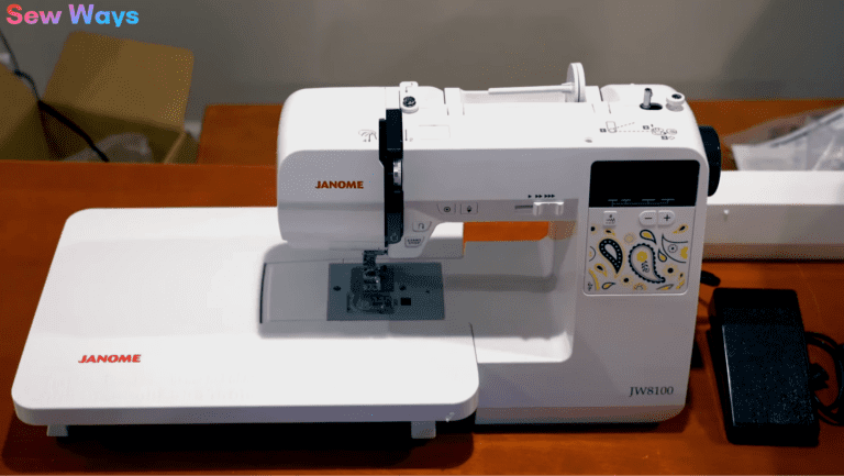 Janome JW8100 Fully-Featured Computerized Sewing Machine with 100 Stitches, 7 Buttonholes, Hard Cover, Extension Table and 22 Accessories